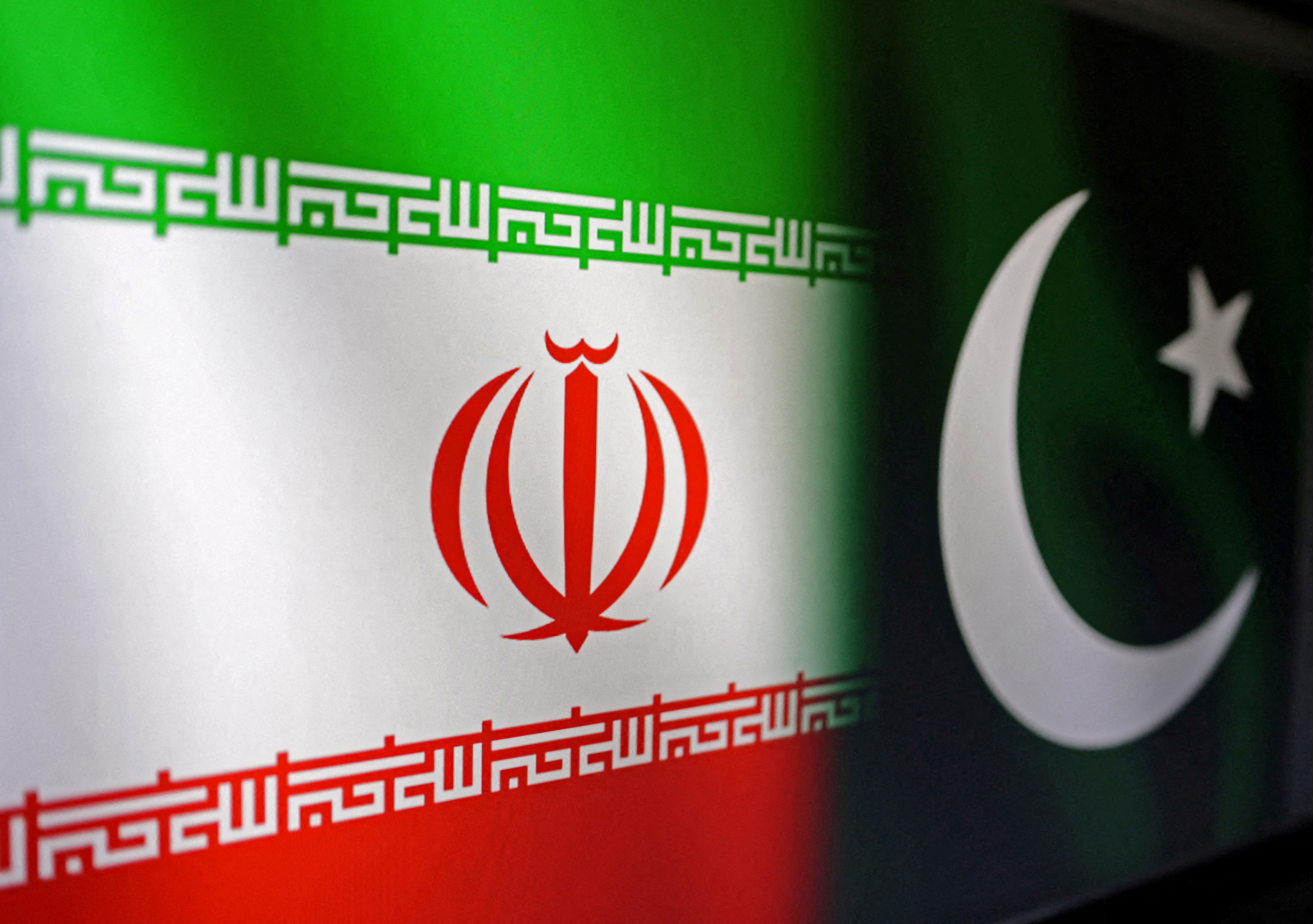 FILE PHOTO: Illustration shows Iranian and Pakistani flags