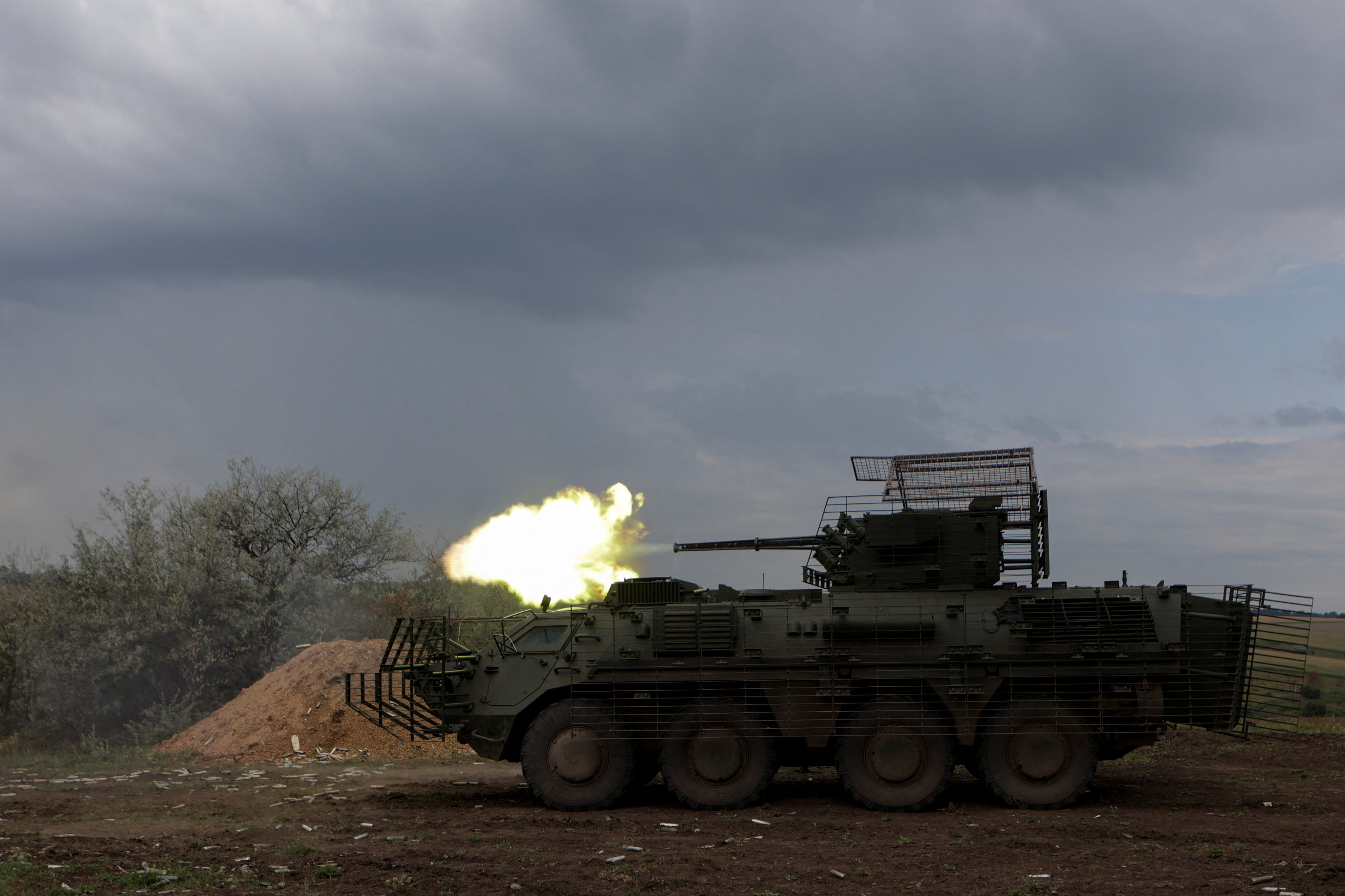 Ukrainian servicemen attend military drills at a training ground in Kharkiv region