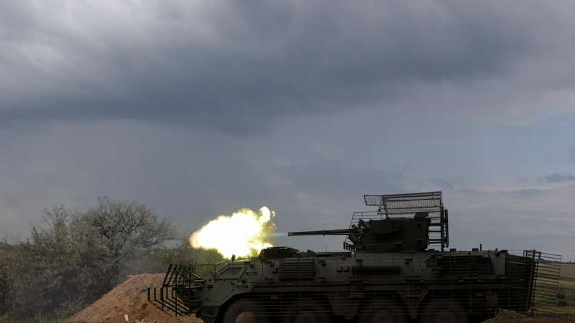 Ukrainian servicemen attend military drills at a training ground in Kharkiv region