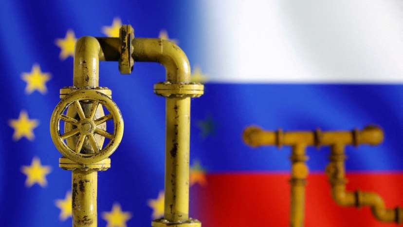 FILE PHOTO: Illustration shows natural gas pipeline, EU and Russia flags