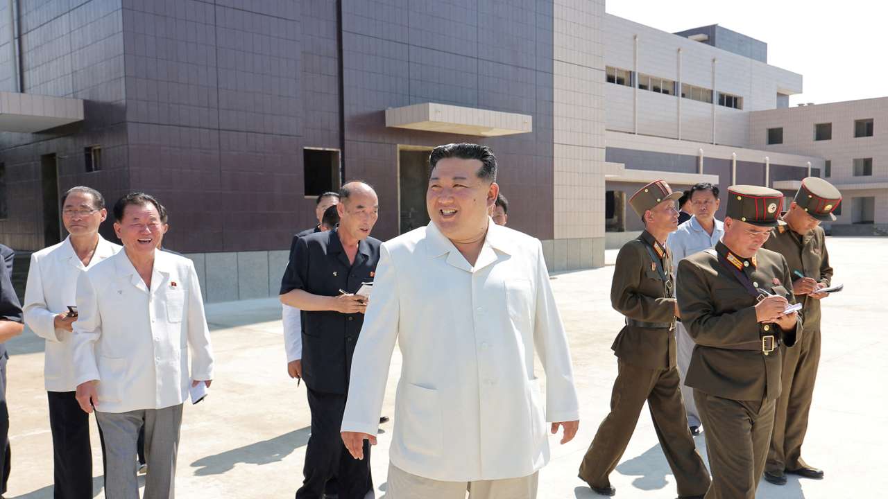 FILE PHOTO: North Korean leader Kim Jong Un visits the construction sites of various North Korean industrial factories