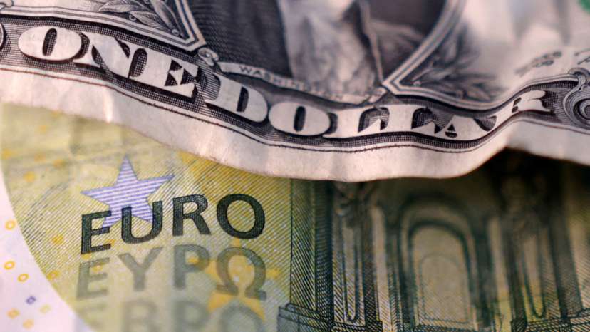 FILE PHOTO: Illustration shows U.S. dollar and Euro banknotes