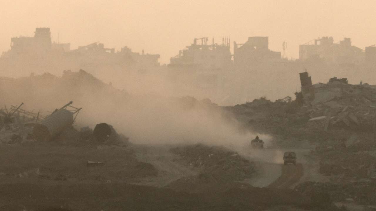 Israeli military vehicles manoeuvre in Gaza