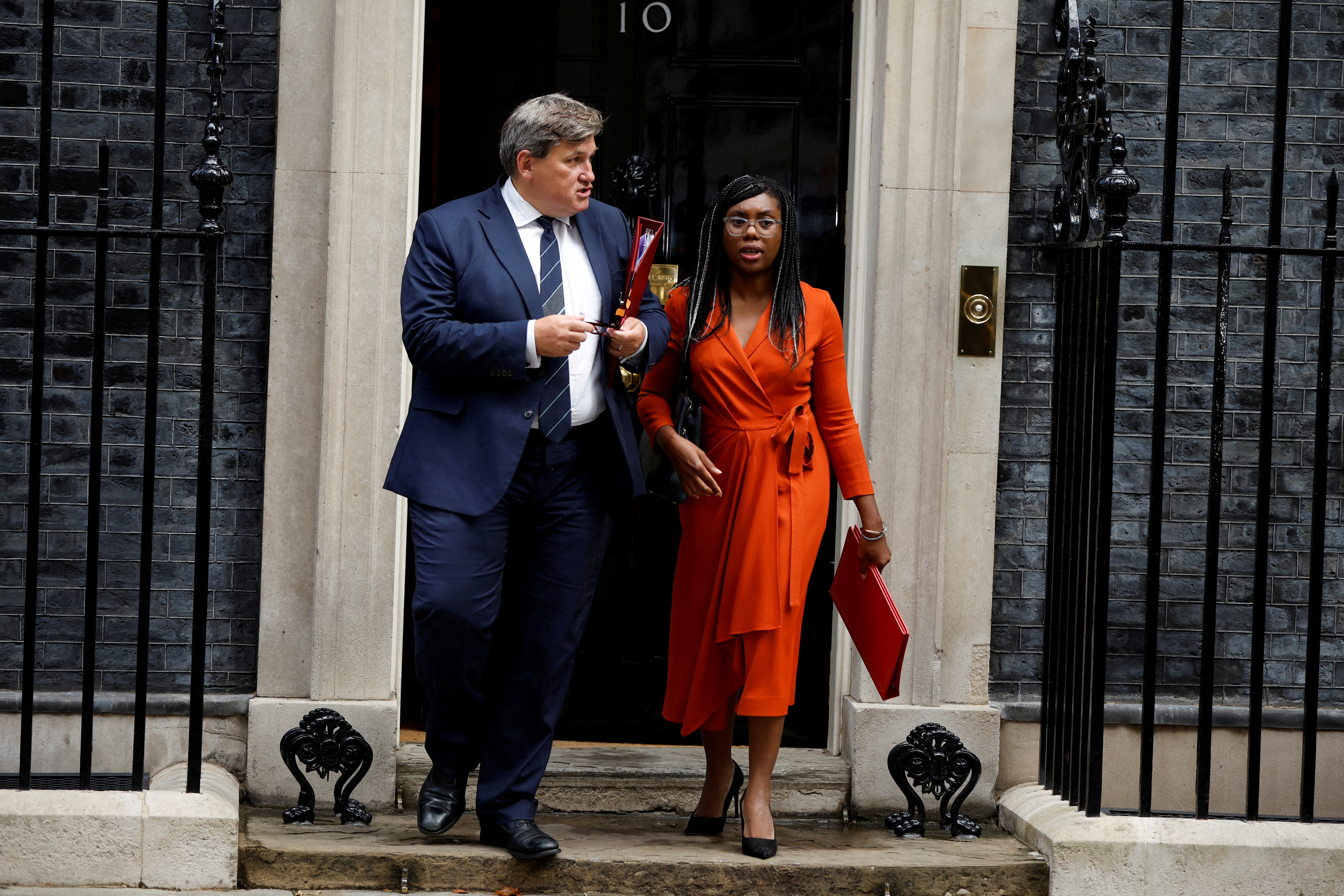 FILE PHOTO: Kemi Badenoch walks outside Cabinet building, in London