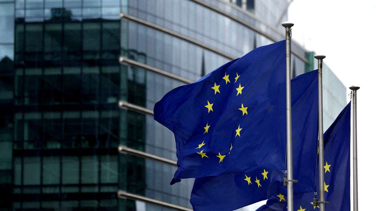 FILE PHOTO: European flags fly outside the European Commission headquarters in Brussels