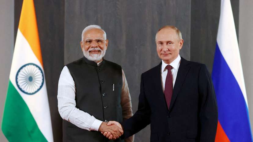 FILE PHOTO: Russian President Putin and Indian Prime Minister Modi meet in Samarkand