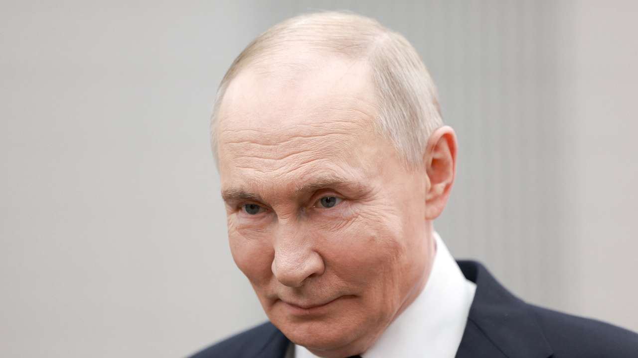 Russian President Vladimir Putin meets with volunteers in Moscow
