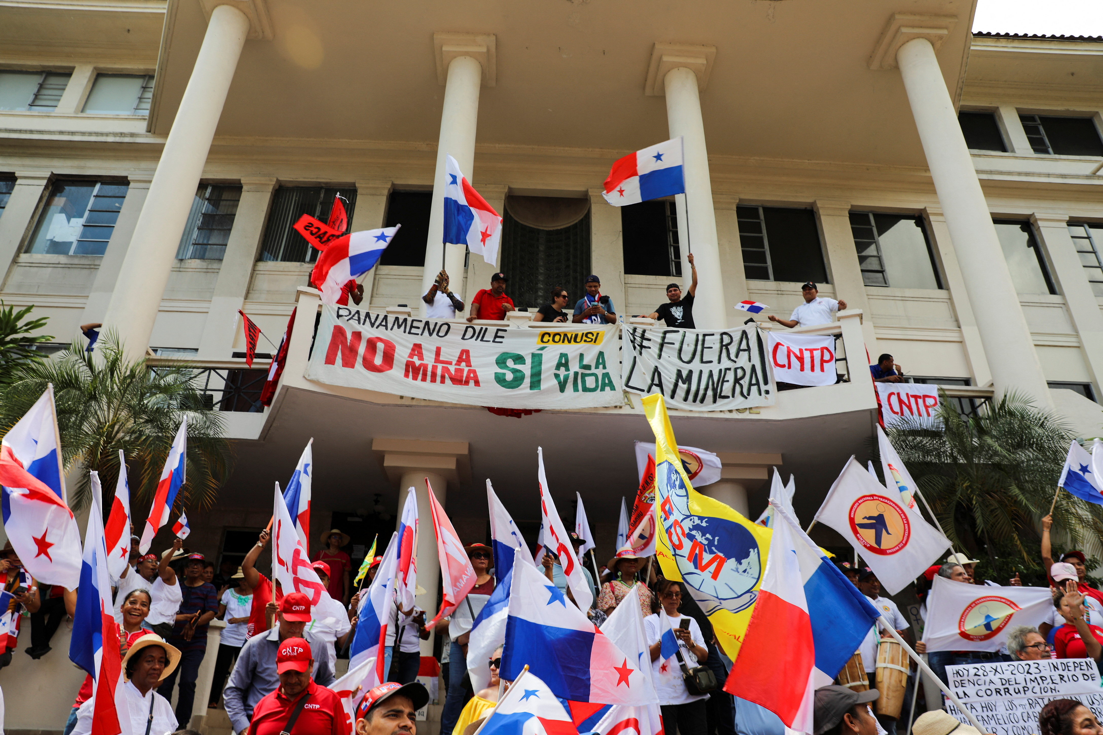 People react after Panama's top court ruled the mining contract with Canadian miner First Quantum to operate a copper mine in the country as unconstitutional, in Panama City