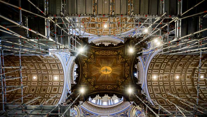 A view of scaffolding around a baroque sculpted bronze canopy by Gian Lorenzo Bernini over the high altar of St. Peter's Basilica in preparation for its restoration, at the Vatican