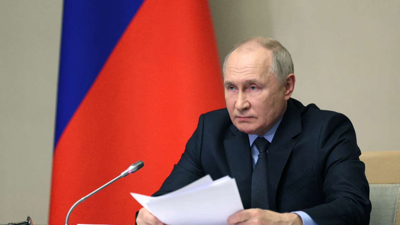 Russian President Vladimir Putin chairs a meeting of members of his Security Council and the government and the heads of law enforcement agencies, outside Moscow