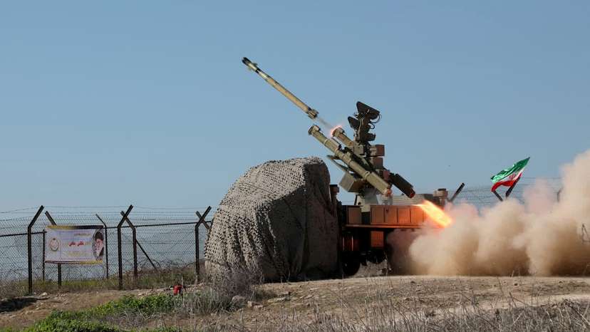 A missile is launched during a military exercise in an undisclosed location in the south of Iran