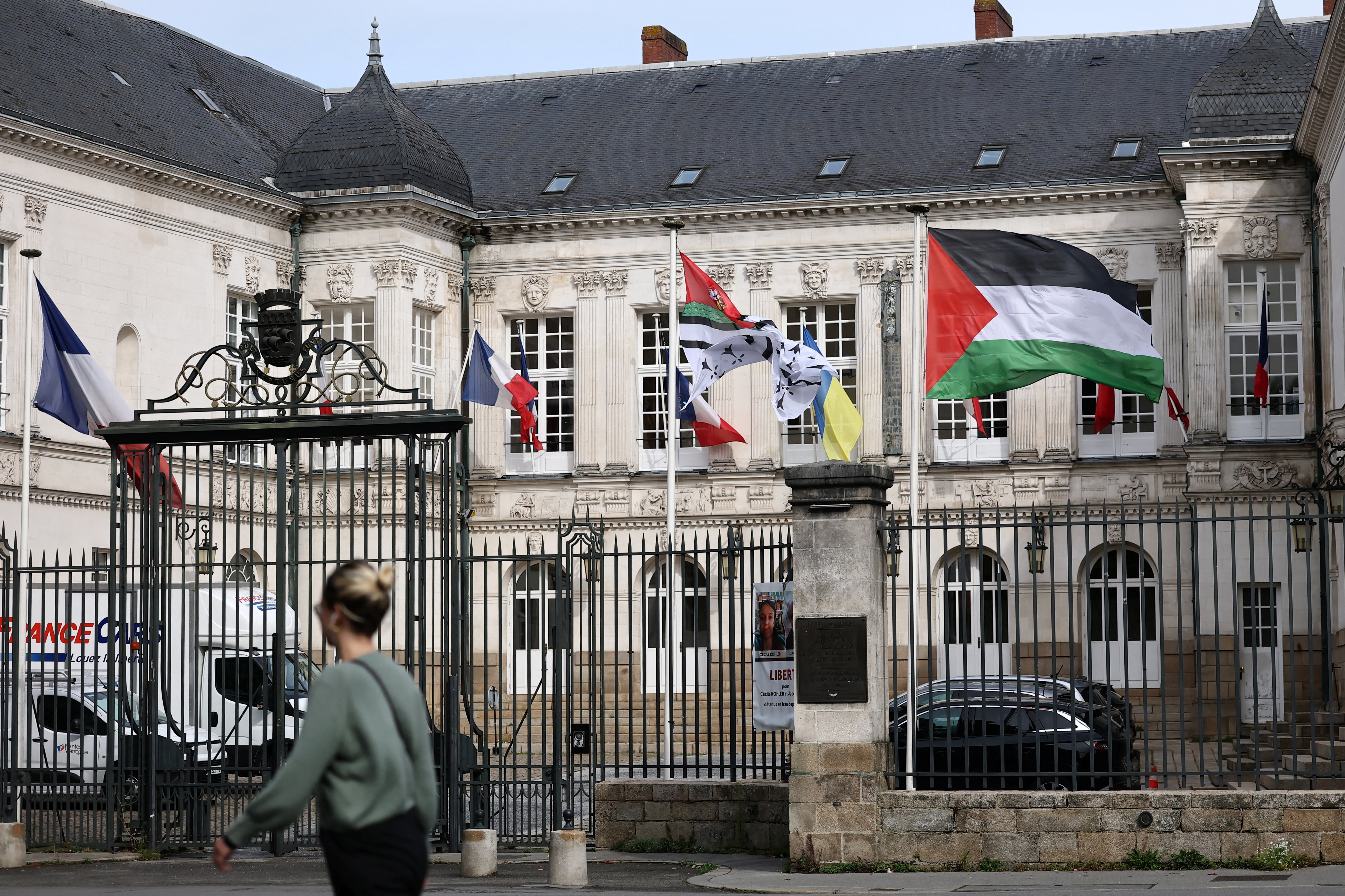 The Palestinian flag flies in front of the city hall in Nantes