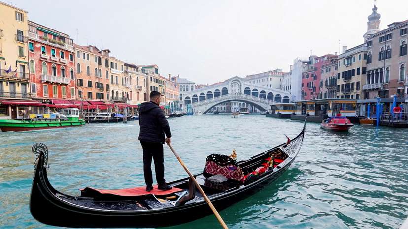 FILE PHOTO: A gondola is pictured on Grand Canal in front of Rialto bridge in Venice
