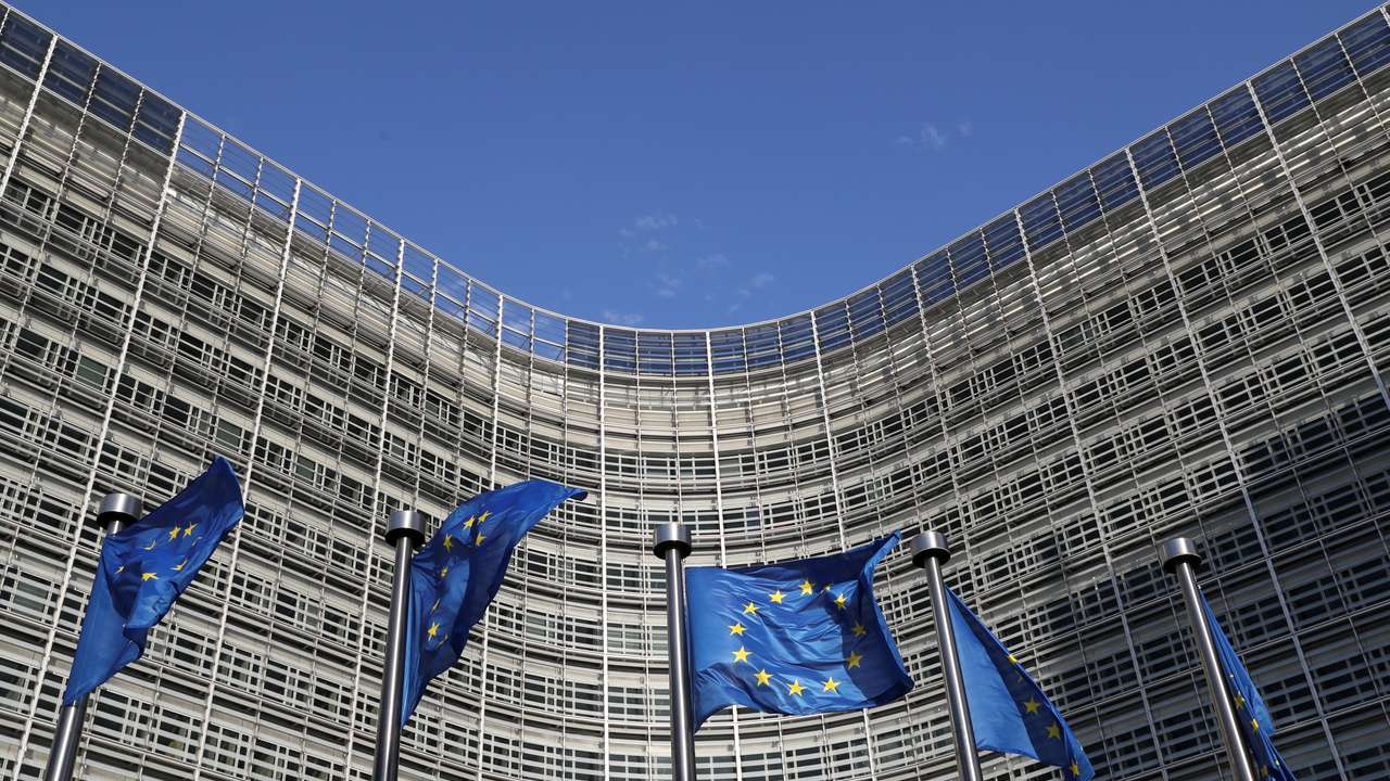 European Union flags flutter outside the European Commission headquarters, in Brussels