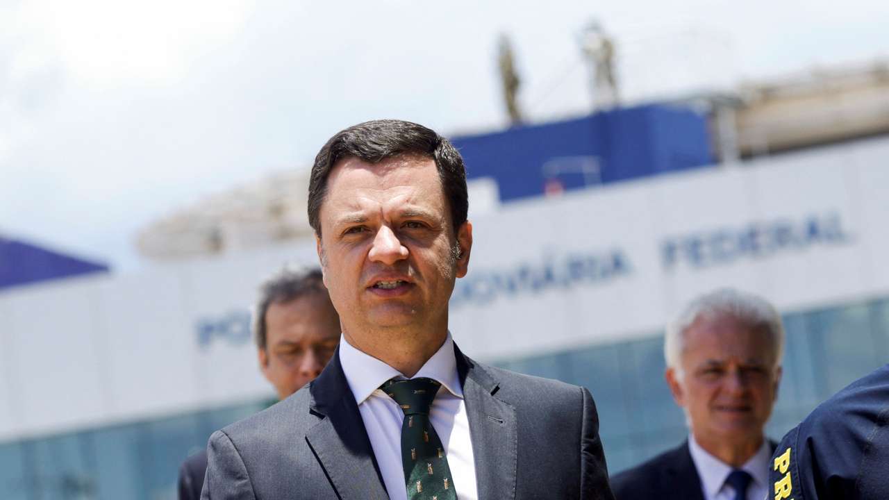 Brazil's Minister of Justice and Public Security Anderson Torres walks on the day of a news conference at Headquarters of the Federal Highway Police in Brasilia