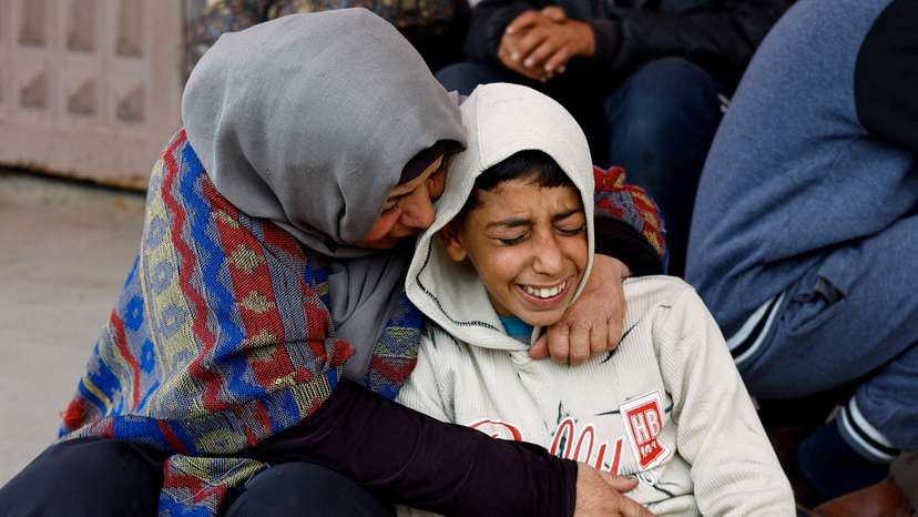 Funeral of Palestinians who were killed by Israeli strikes, according to medics, in Deir al-Balah