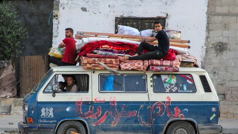 Palestinians flee Rafah after Israeli forces launched a ground and air operation in the eastern part of the southern Gaza city