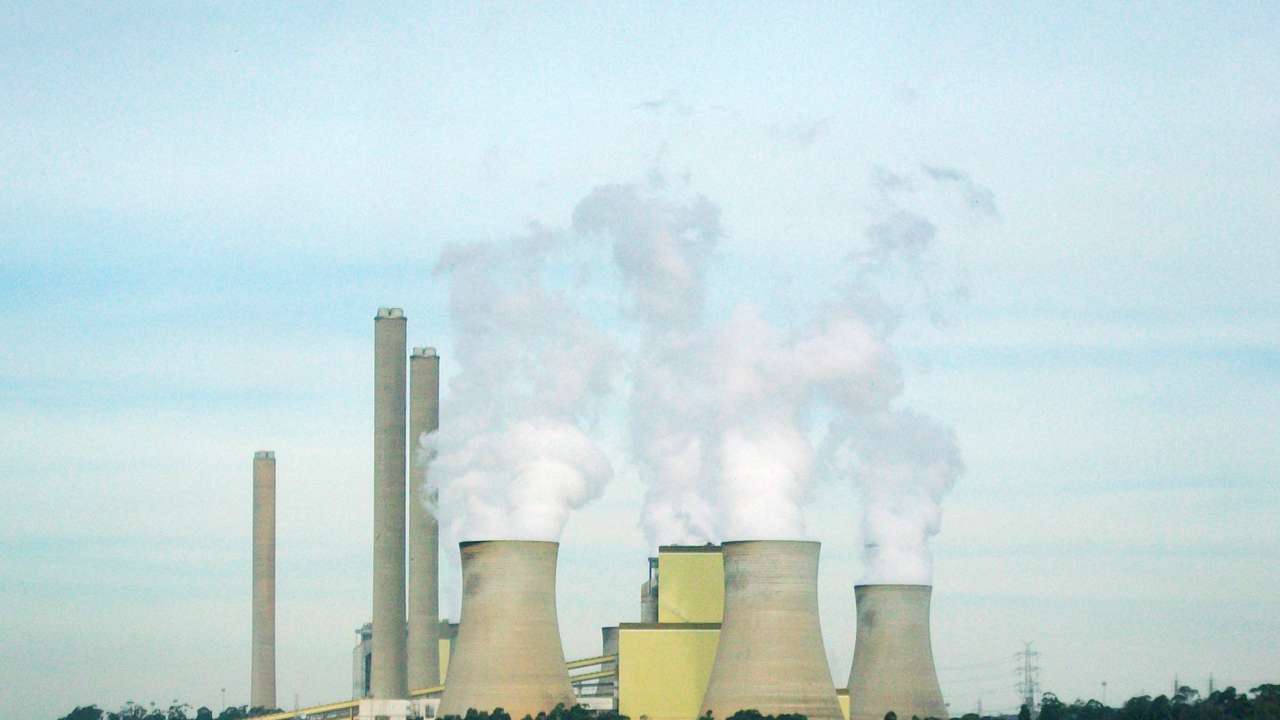 Vapour rises from cooling towers at the Loy Yang coal fired power station