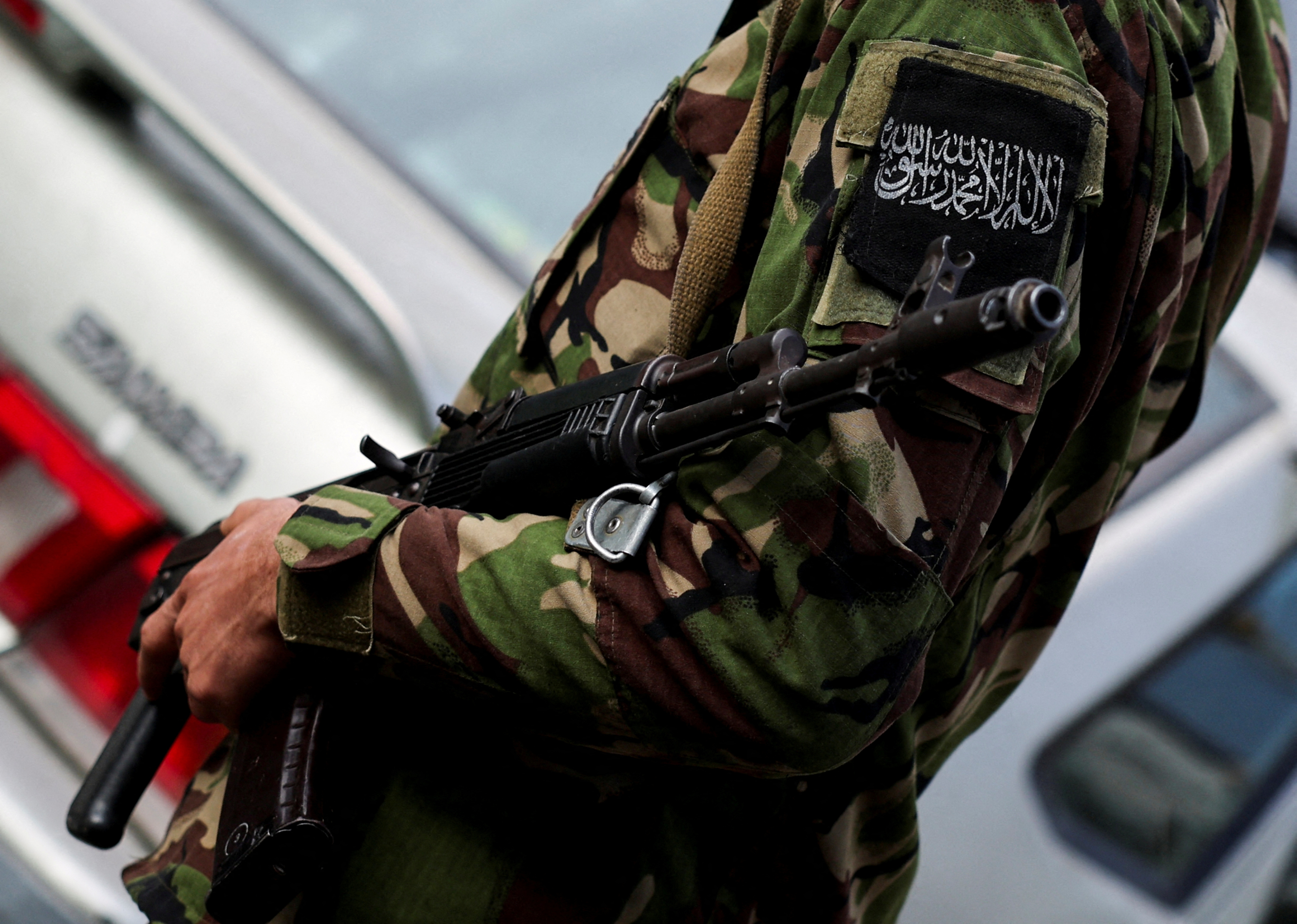 Fighters of the ruling Syrian body patrol, in Damascus