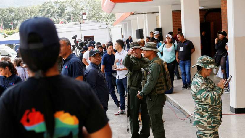 FILE PHOTO: Venezuelans participate in an electoral simulation of a referendum over disputed territory, in Caracas