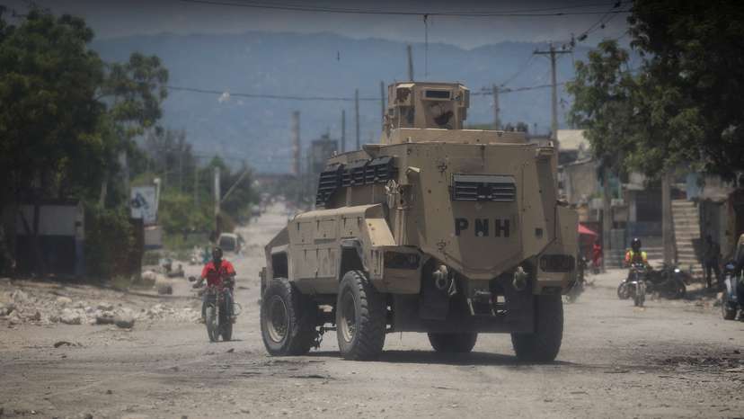 FILE PHOTO: Haitian National Police patrols in an armoured vehicle in the Cite Soleill
