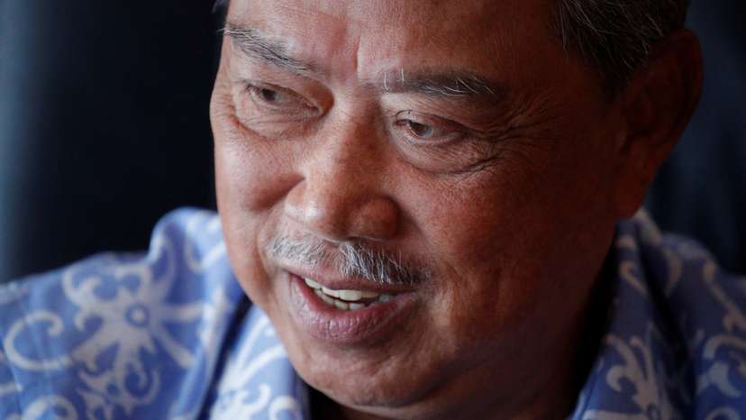 FILE PHOTO: Malaysian opposition leader and former premier Muhyiddin Yassin speaks during an interview at Kuala Lumpur