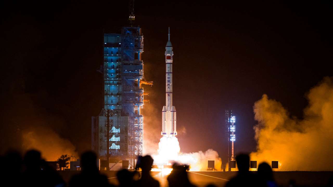 FILE PHOTO: A Long March-2F carrier rocket carrying the Shenzhou-18 spacecraft takes off from Jiuquan Satellite Launch Center