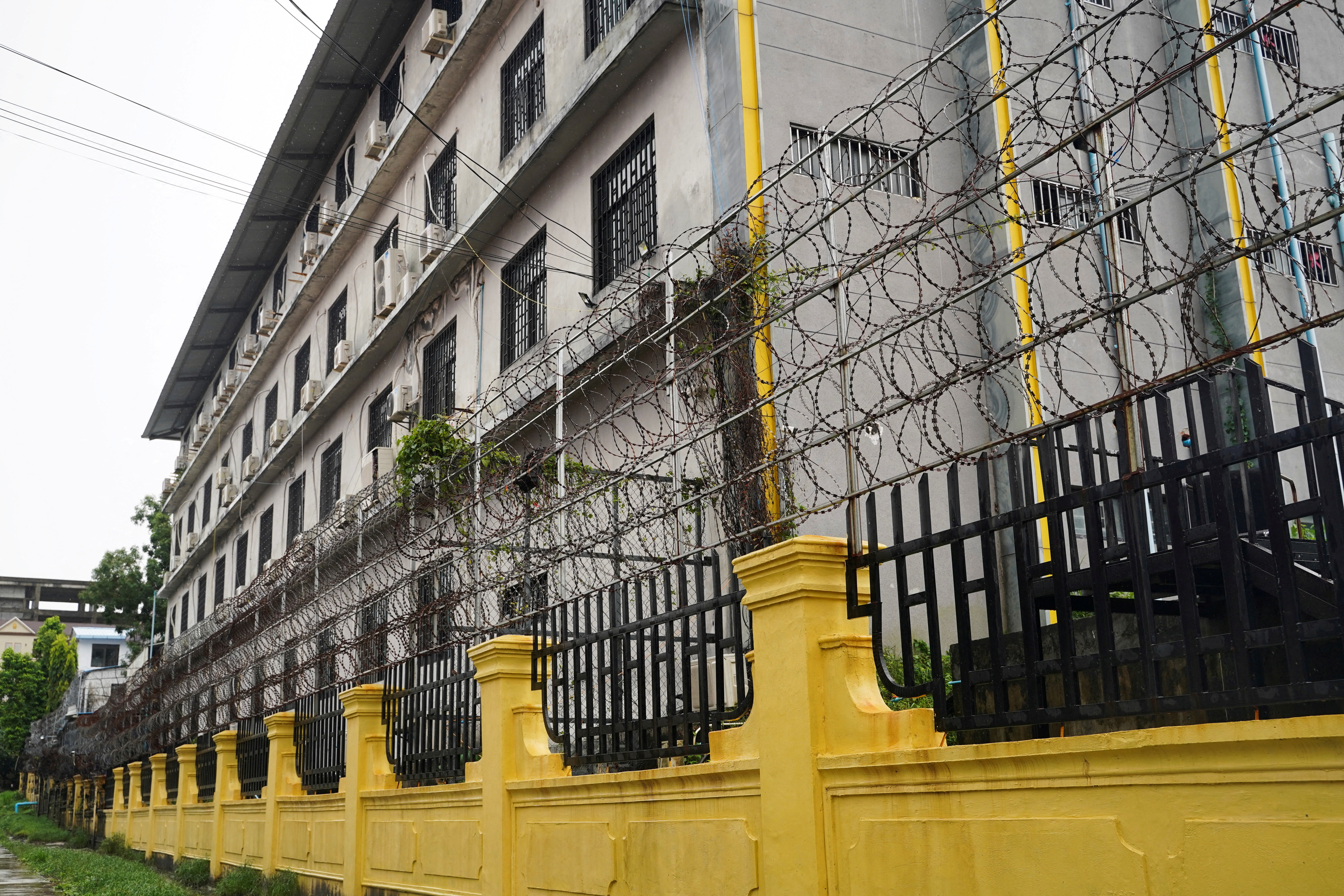 FILE PHOTO: Cambodian police raid alleged cybercrime trafficking compounds