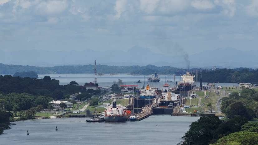 Cargo vessels transit through the Panama Canal, in Colon
