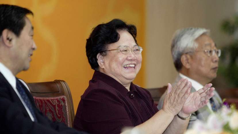FILE PHOTO: Peng Peiyun, former State Councillor, claps at the second Asian Women's Forum in Beijing