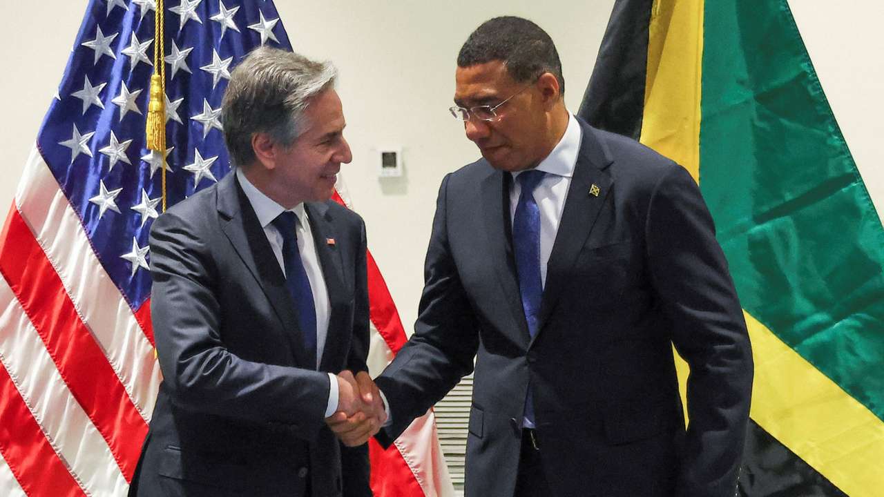 U.S. Secretary of State Antony Blinken and  Jamaican Prime Minister Andrew Holness shake hands at the Pegasus Hotel in Kingston, Jamaica, March 11, 2024. REUTERS/Gilbert Bellamy