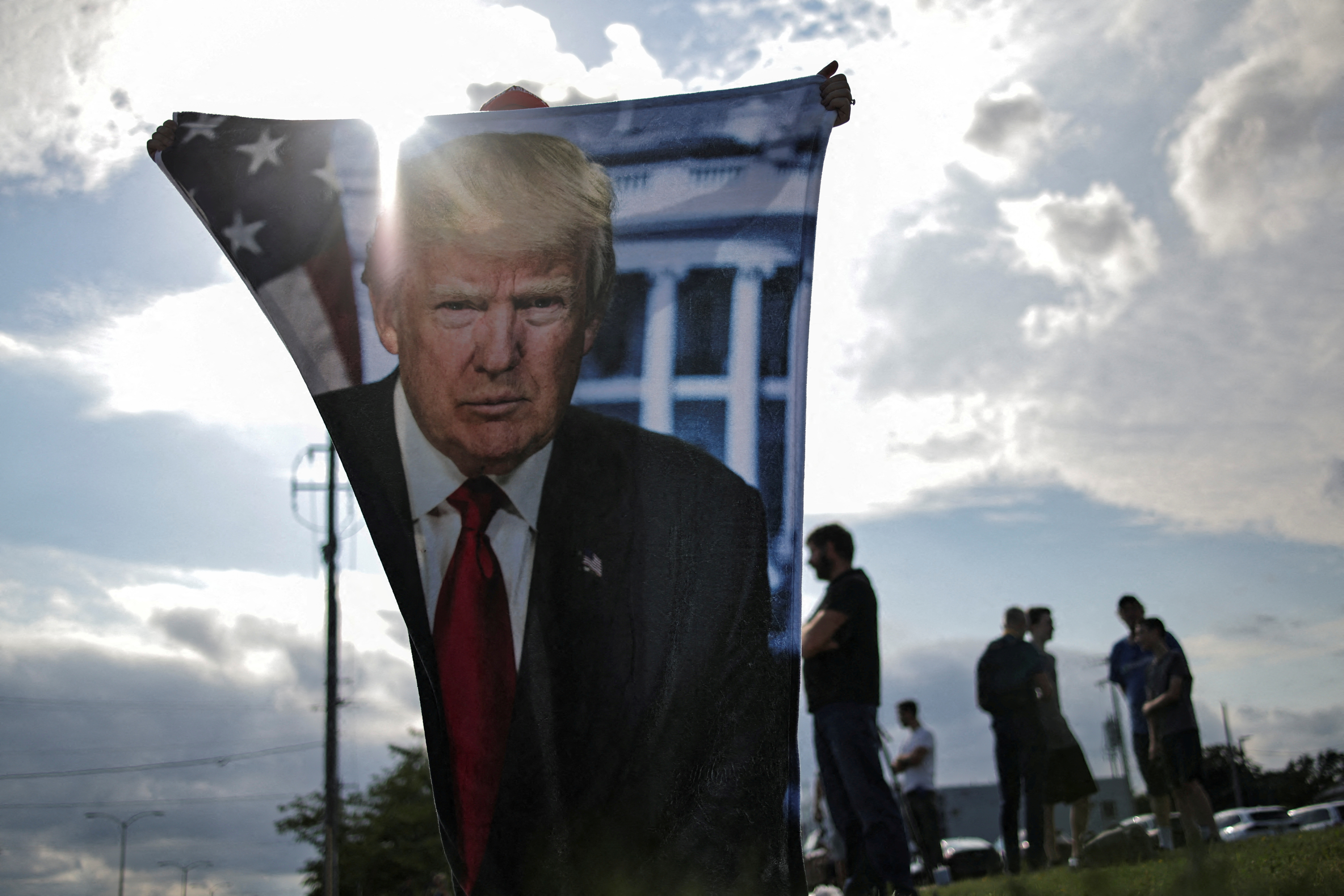 Supporters of Republican presidential candidate and former U.S. President Donald Trump wait for his arrival in Milwaukee