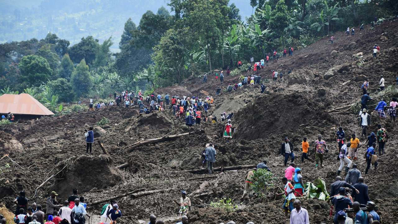 Ugandan villagers search for those buried by deadly mudslide
