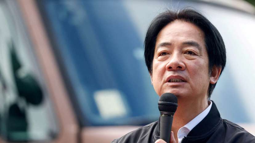 FILE PHOTO: Taiwan President Lai Ching-te inspects reservists during a training session at Loung Te Industrial Parks Service Center in Yilan