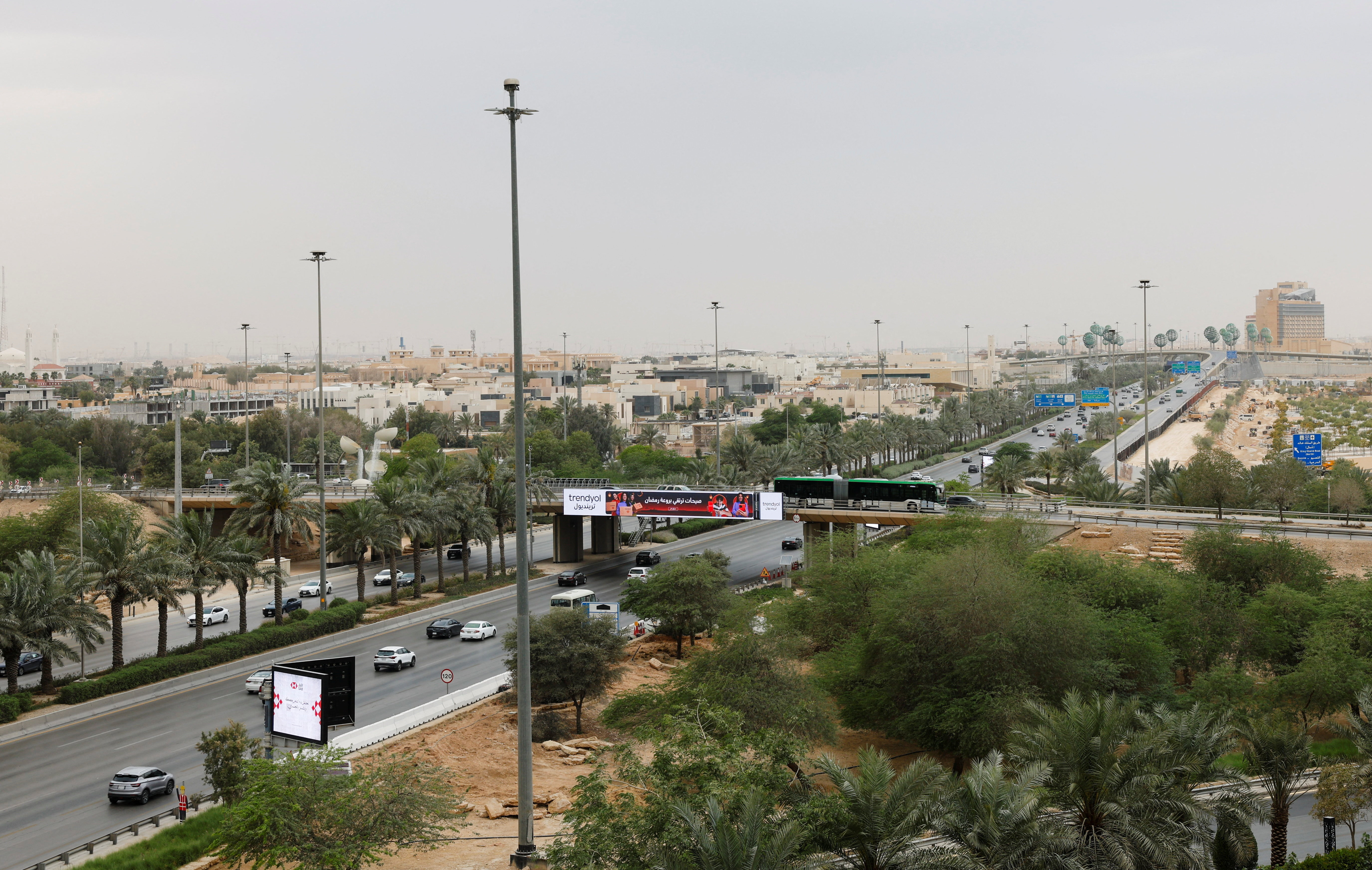 Vehicles ply along a road, amid the U.S.-Israeli conflict with Iran, in Riyadh