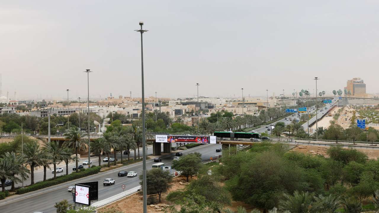 Vehicles ply along a road, amid the U.S.-Israeli conflict with Iran, in Riyadh