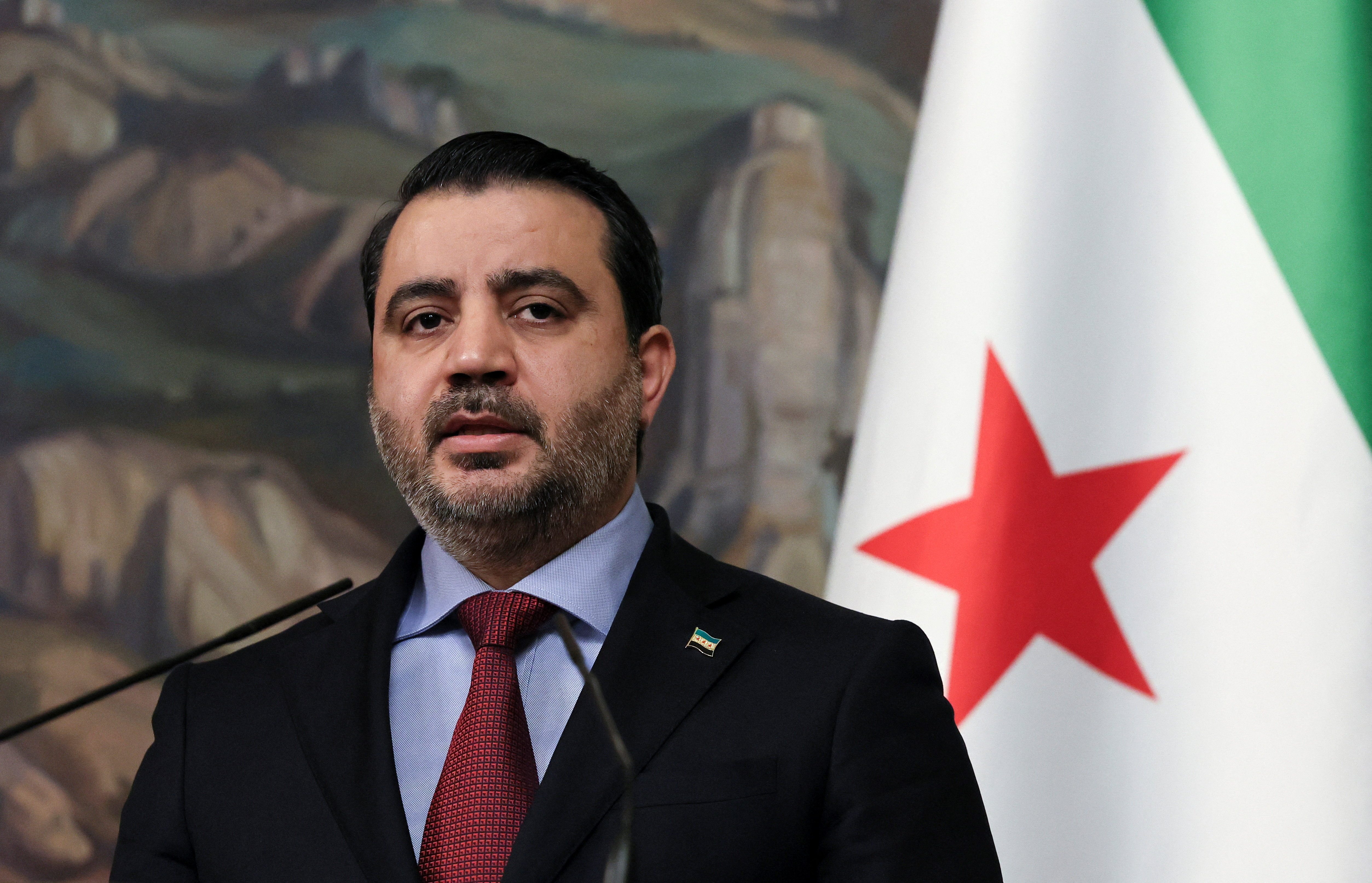FILE PHOTO: Syrian Foreign Minister Asaad Hassan al-Shibani speaks during a press conference following talks with Russian Foreign Minister Sergei Lavrov in Moscow, Russia, July 31, 2025. REUTERS/Shamil Zhumatov/Pool/ File Photo