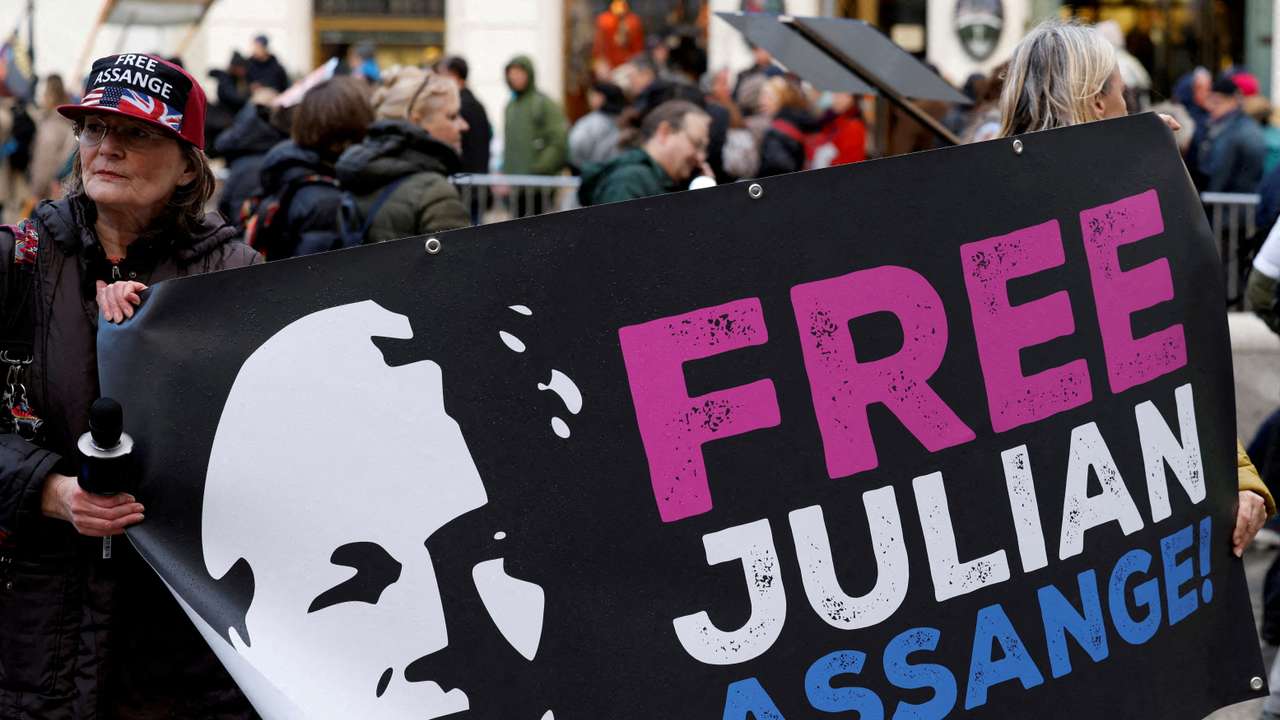 FILE PHOTO: Supporters of WikiLeaks founder Julian Assange protest in Vienna