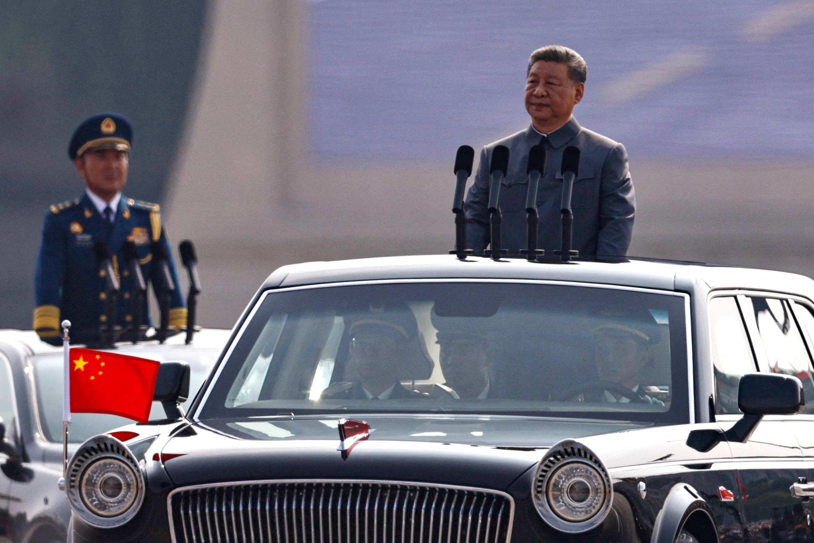 FILE PHOTO: Chinese President Xi Jinping reviews troops in Beijing