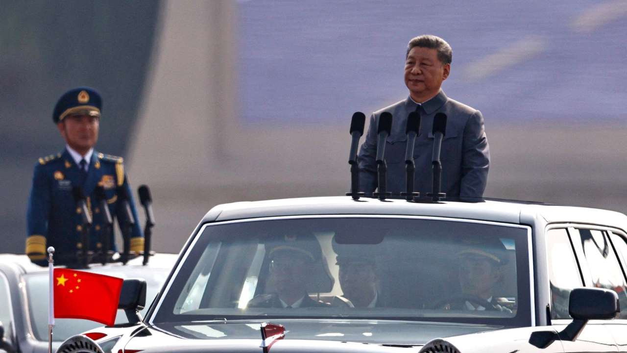 FILE PHOTO: Chinese President Xi Jinping reviews troops in Beijing