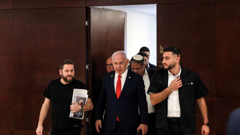 Israeli PM Netanyahu and National Security Minister Ben-Gvir walk inside Knesset in Jerusalem