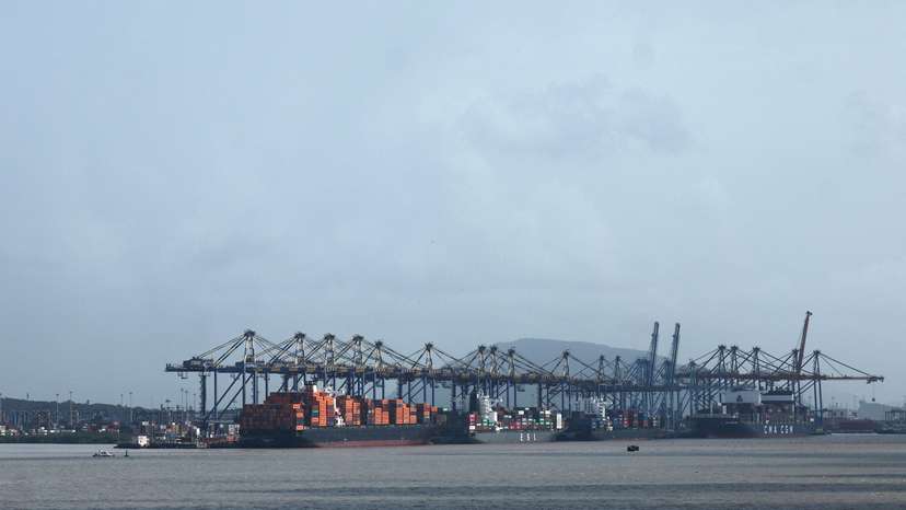 Shipping containers are seen on a ship at the Jawaharlal Nehru Port in Navi Mumbai