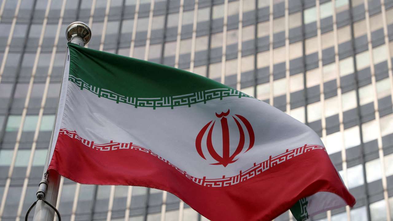 FILE PHOTO: The Iranian flag flutters in front of the International Atomic Energy Agency (IAEA) organisation's headquarters in Vienna
