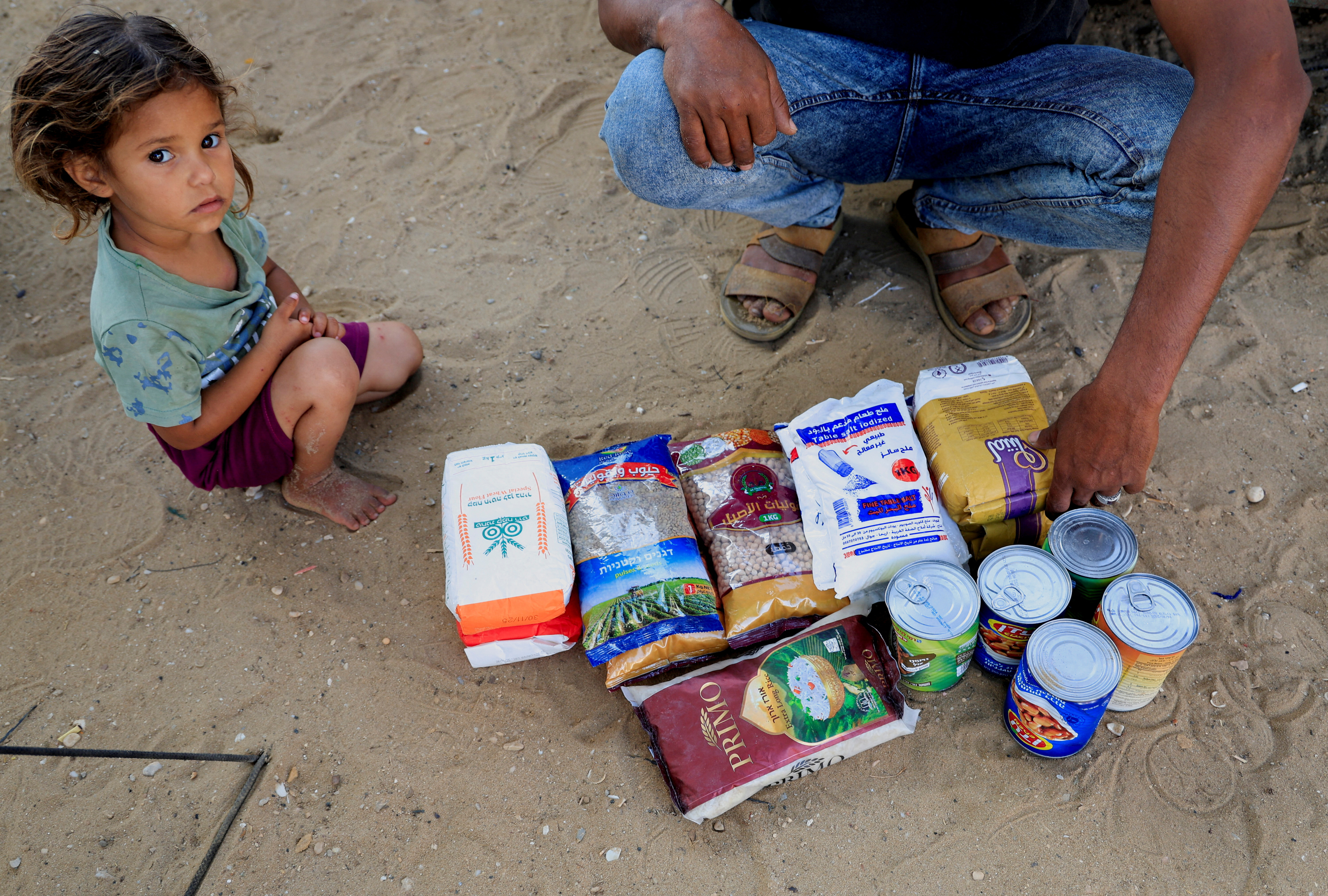 FILE PHOTO: Visual story on the ordeal Gazans endure to get food under new aid distribution programme in Khan Younis
