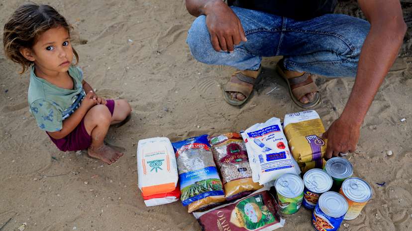 FILE PHOTO: Visual story on the ordeal Gazans endure to get food under new aid distribution programme in Khan Younis