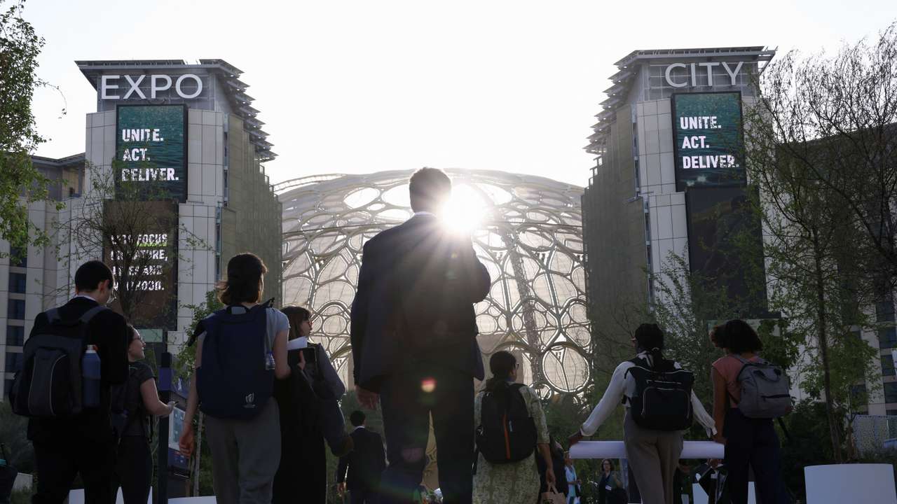 Attendees arrive for the opening of U.N.'s COP28 climate summit in Dubai