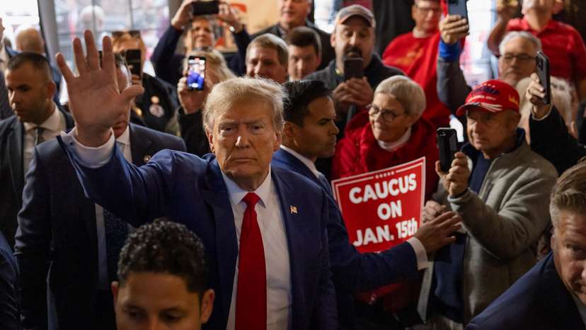 Former U.S. President and Republican presidential candidate Donald Trump attends a "commit to caucus" event, in Ankeny