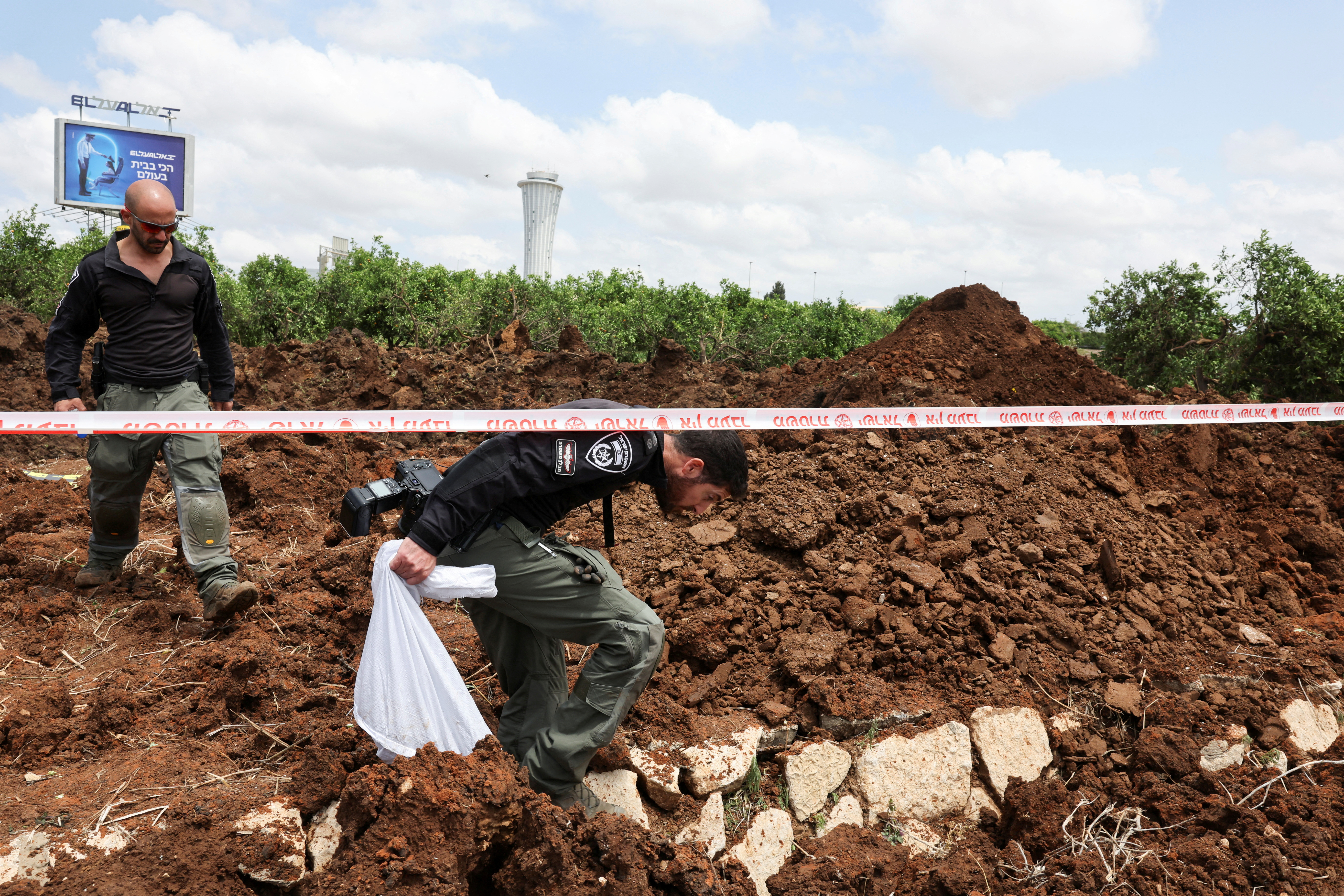 A view of the site of a missile attack, launched from Yemen, near Ben Gurion Airport, in Tel Aviv