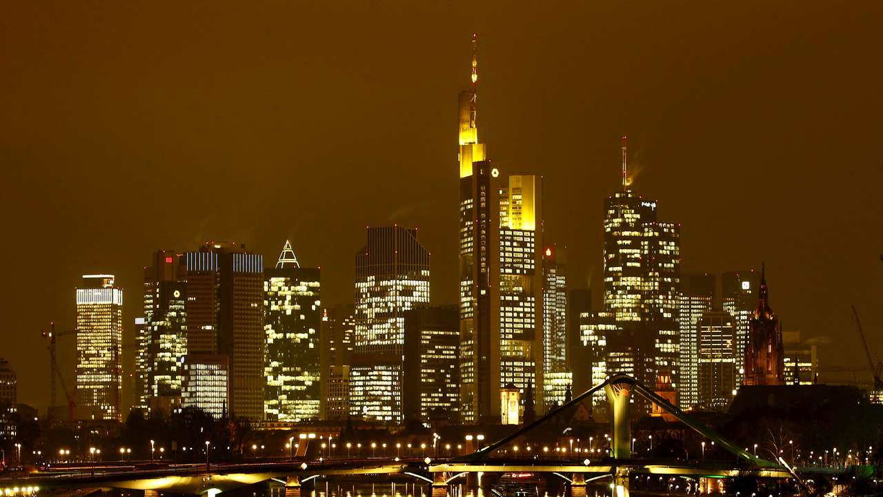 FILE PHOTO: The famous skyline with its banking district is pictured in early evening next to the Main River in Frankfurt, Germany