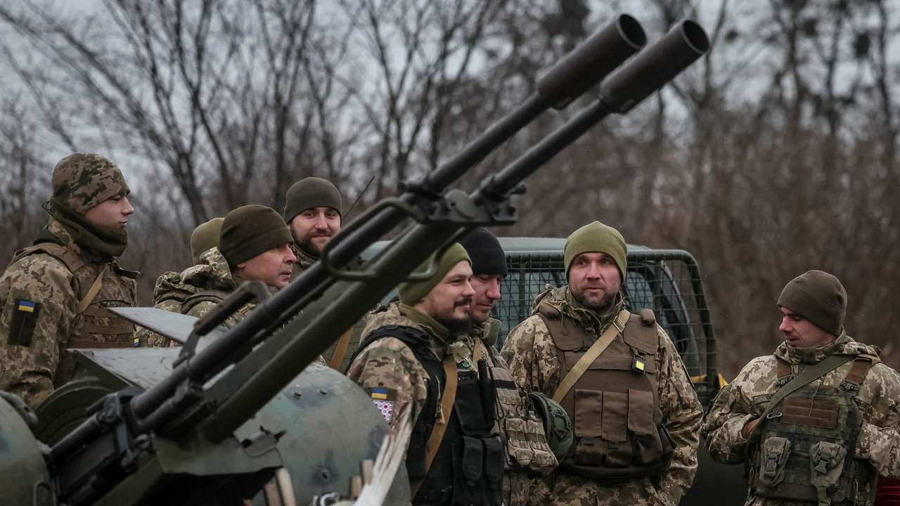 Ukrainian servicemen from air defence units prepare for an award ceremony after repelling the second biggest Russian missile and drone attack in five days, near Kyiv